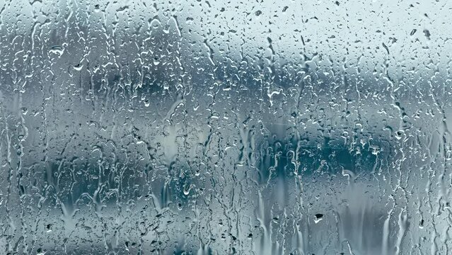 The Rain Drops on Window Glass