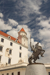 Statue of King Svatopluk and Bratislava castle in the background, Bratislava, Slovakia