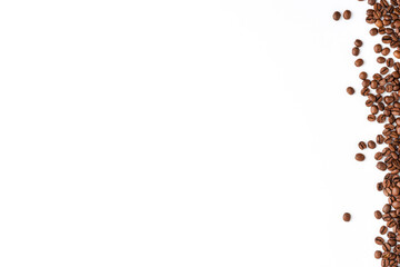 Roasted coffee beans isolated on white background. Close up