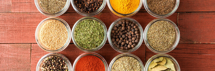 Various kinds of spices in bowls. Big collection. Top view