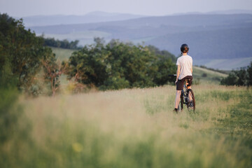 Freedom bike rider on a field