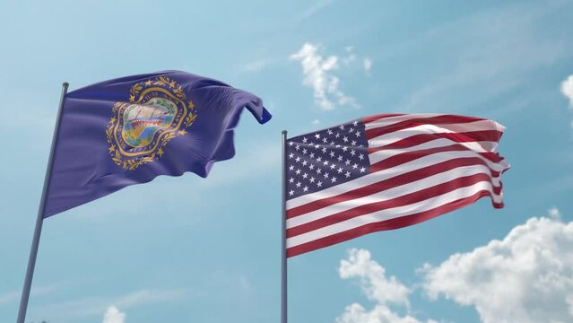 New Hampshire flag and the USA flag on a flagpole realistic wave on strong wind in blue sky as a screensaver or intro. State of New Hampshire and The United States of America