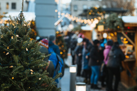 Bustling Christmas Market Scene with Festive Decorations in Quebec, Canada