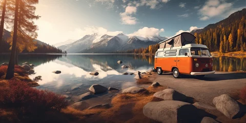  A van traveling at sunset in nature at the Lake in the mountians, road trip to adventure and freedom © Eli Berr