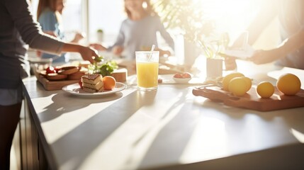 A family preparing breakfast in absolute, a photo focused on the table - obrazy, fototapety, plakaty