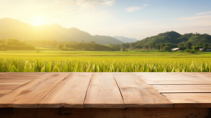 Empty wood table and blurred rice field and mountain landscape at morning. Empty wooden table with...