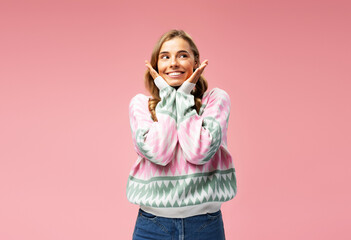 Portrait of smiling beautiful cute woman wearing stylish warm winter sweater looking away