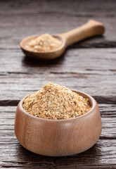 Soy fiber to cleanse the colon with psyllium in the bowl and wooden spoon