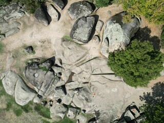 Aerial top view of Thracian megalithic sanctuary Beglik tash in Primorsko