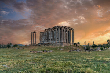 Fototapeta na wymiar Aizanoi ancient city and Zeus temple located within the borders of Kutahya province with their unique sky colors