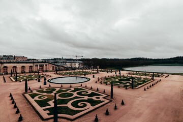 Iconic Palace of Versailles on a cloudy day in Versailles, France