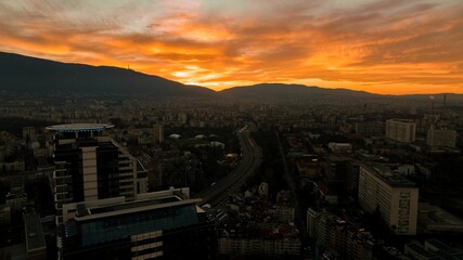 Beautiful view of an orange sunset over the cityscape