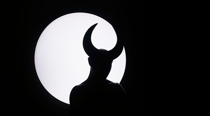 Silhouette of horned devil demon figure on white circle background cutout  - obrazy, fototapety, plakaty