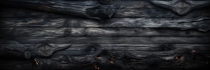 Foto op Aluminium Brandhout textuur Burned wood texture background, banner with charred black timber. Abstract pattern of dark burnt scorched tree. Concept of charcoal, coal, grill, embers, fire, firewood, barbecue