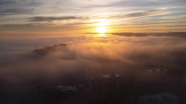 Aerial time lapse of the fog movement over the cityscape of Roudnice nad Labem in the Czech republic