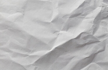 Crumpled white paper, uneven surface of the gray paper.