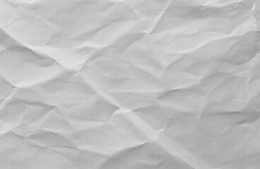 Crumpled white paper, uneven surface of the gray paper.