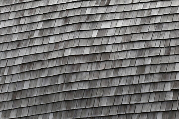 old wooden wall in the shape of small squares arranged together.