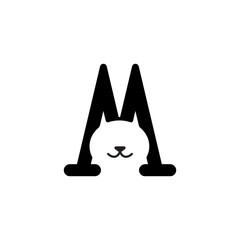 negative space letter m with a cat