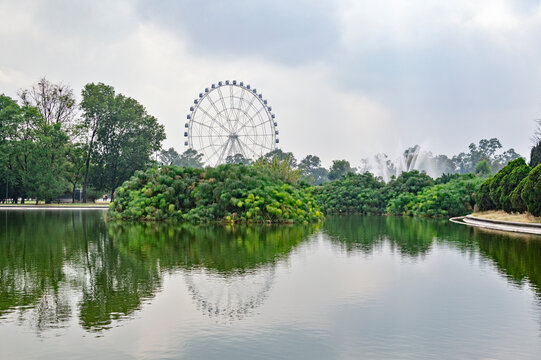 lake in chapultepec park  and roller coaster in mexico city 