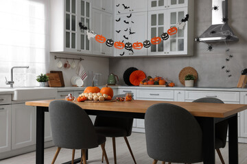 Stylish kitchen interior with festive decor. Halloween celebration