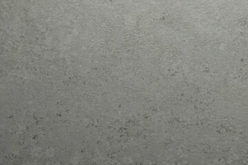 Fototapeta premium Texture of light grey stone surface as background, closeup
