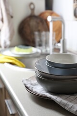 Clean bowls near kitchen sink. Washing dishes