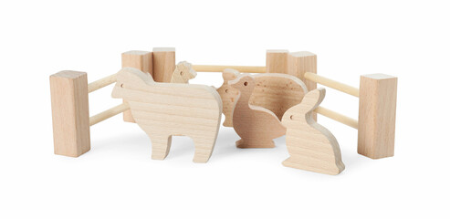 Wooden animals and fence isolated on white. Children's toy