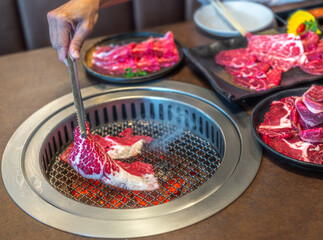 wagyu beef in plate on korean barbeque table in Japanese restaurant