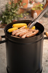 Peruvian Barrel Grill with Chorizos and Roasted Corn vertical with botton space