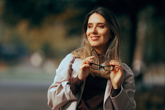 Woman Not Needing Her Glasses after Diopter Eye Surgery. Beautiful lady not needing her eyeglasses after corrective procedure
