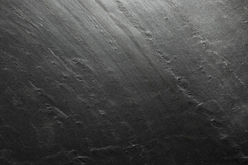 Texture of grey stone surface as background, closeup