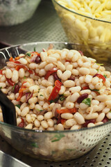  boiled Beans in a bowl served with salad 