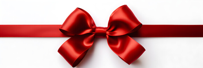 Red ribbon and gold bow isolated on a white background,