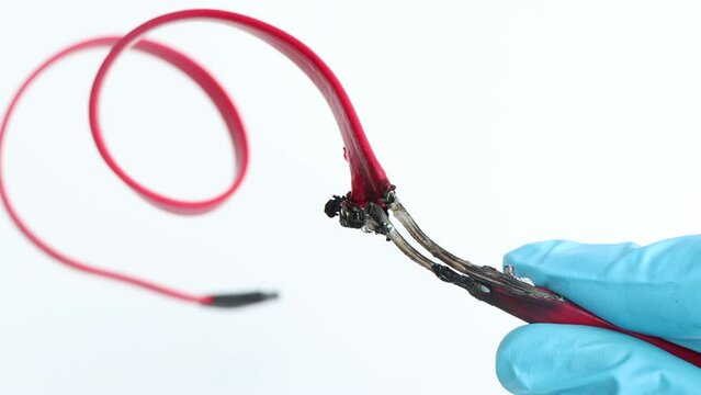 The electrical wire was burned cause electrical leak, white background 