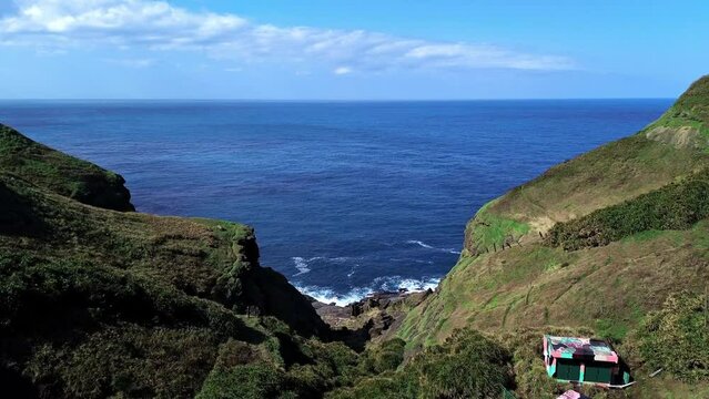Aerial 4k footage of Bitoujiao, a famous scenery of Taiwan northeast corner. Birds eye view in Bitoujiao cape, Ruifang district, New Taipei, Taiwan.
