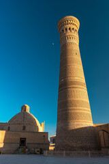 Fototapeta premium View over the Poi Kalon Mosque and Minaret at the sunset, Bukhara, Uzbekistan.