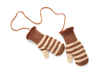 Pair of warm mittens on white background