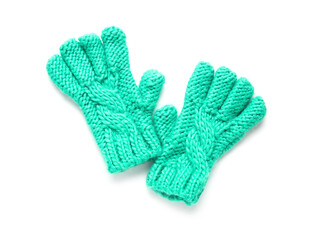 Warm knitted gloves isolated on white background
