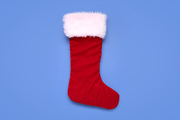 Christmas sock on blue background
