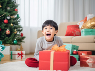 Obraz na płótnie Canvas A child was happy to receive presents at Christmas