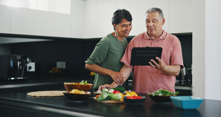 Senior couple, tablet and recipe for meal, kitchen and cooking together for bonding, smile and support. Happy elderly people, healthy food and diet in retirement, fun and app for meal prep or web