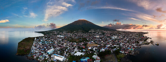defaultstunning Ternate, Maitara and Tidore Island from bird eye view at sunset. These islands is called the land of spices in the past because western people searching for spices until Moluccas.  - Powered by Adobe