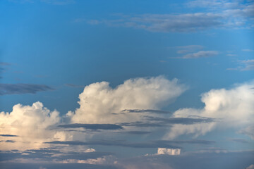 Cumulus clouds with a broad spectrum of blue shades