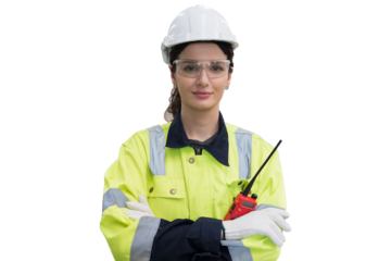 Portrait of female engineer worker wearing safety uniform, helmet, gloves standing with crossed arms on white background