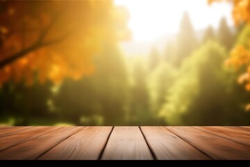 Naklejka na ściany i meble Wooden table with bokeh autumn leaves on nature forest background. Mock up for display of product. High quality photo. 