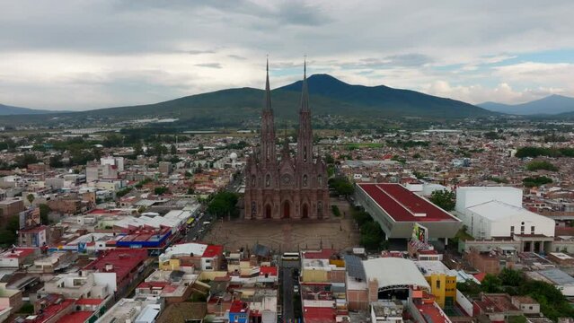 DRONE SHOT OF ZAMORA MICHOACAN DOWNTOWN WITH A CATHEDRAL