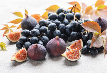 Fresh ripe figs and dark grapes