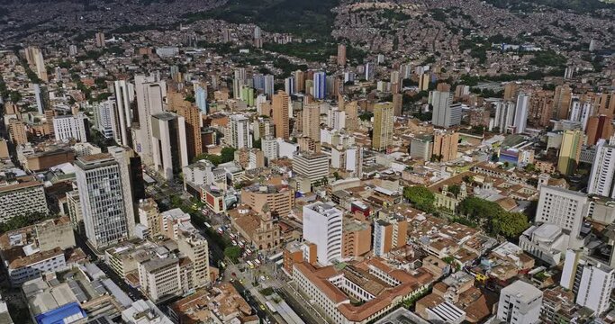 Medellin Colombia Aerial v48 flyover La Candelaria capturing urban downtown cityscape and busy traffics at intersection between Avenida Oriental and Calle 52 - Shot with Mavic 3 Cine - November 2022
