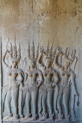 Apsara - Stone bas relief depicting Heavenly nymphs and celestial dancers at the courts of the...